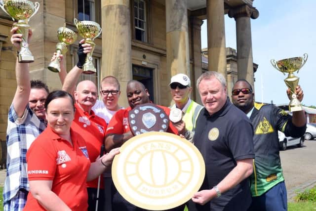 National championship winners, Sunderland Spinners partially sighted bowls team with Fans Museum Michael Ganley
