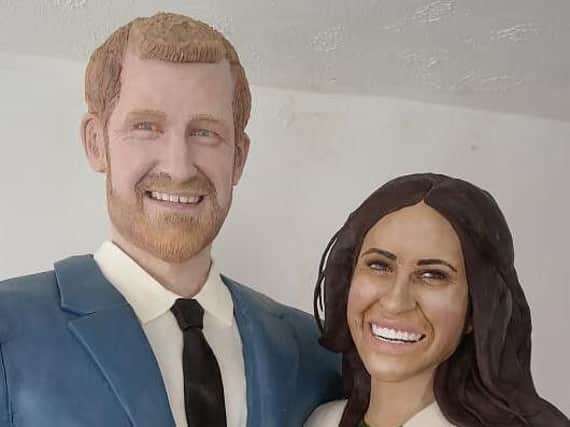 The Royal couple's faces were made using modelling chocolate and sugar.