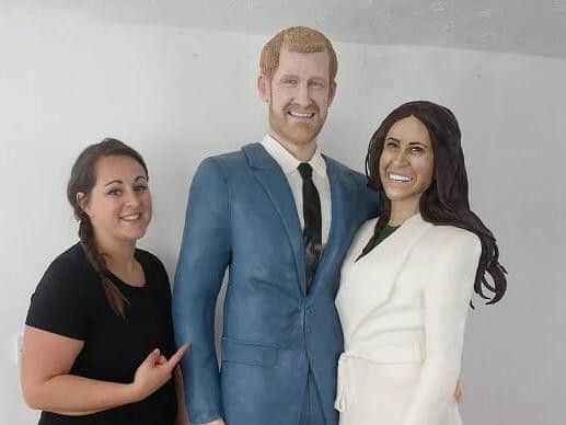 Lara Mason with her finished cake versions of Prince Harry and Meghan Markle.