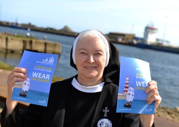 Sister Mary Scholastica with the Wear on Board Tall Ships leaflets she has been giving to visiting sailors