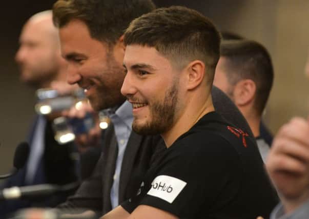 Josh Kelly enjoys a laugh with promoter Eddie Hearn. Picture by Stu Norton.