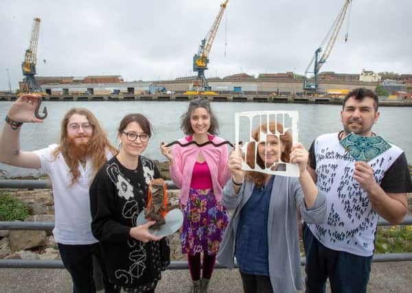 Glass and Ceramics students Michael Emmett, Helen Pailing, Anna Selway, Liz Waugh McManus and Antonis Koutouzis outside the National Glass Centre in Sunderland.