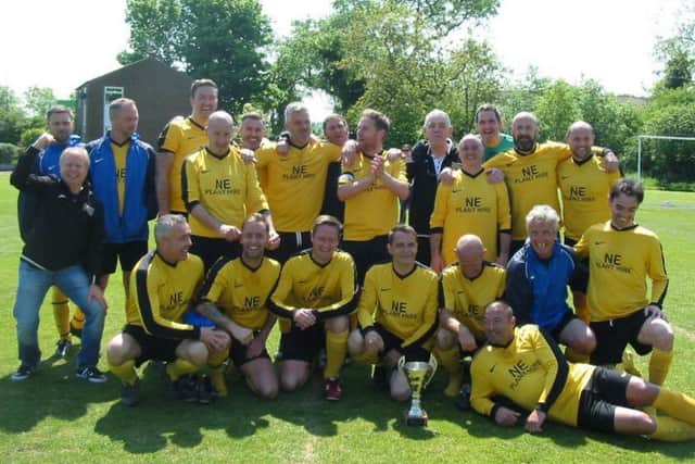 Penshaw Catholic Club celebrate their victory in the cup final.