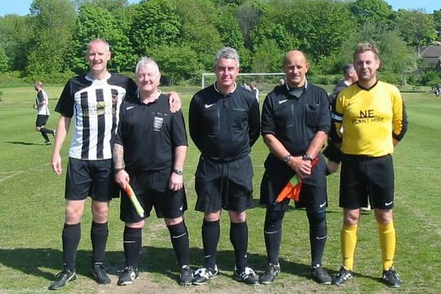 Referee Ken Short and assistants Les Watts and Robert Robson with the two captains before the cup final kick-off