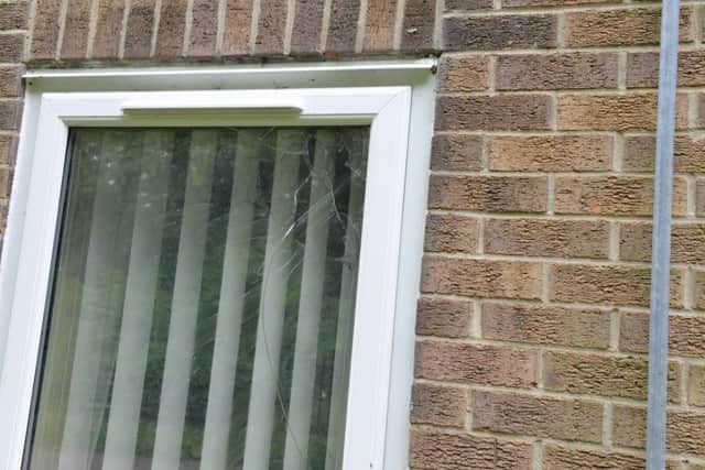 The smashed window