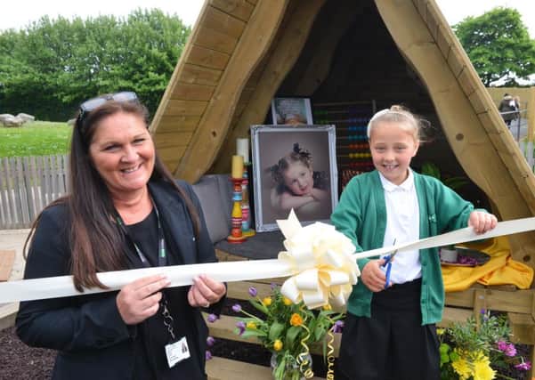 Michelle Ord and great-niece Eden Bleek, seven, officially open the new park.