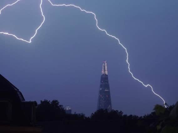Photo taken from Instagram with permission from @samueltwilkinson of lightning over The Shard in central London on Saturday.