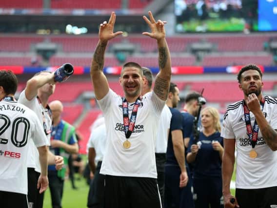 Aleksandar Mitrovic celebrates after helping Fulham win the Championship play-off at Wembley.