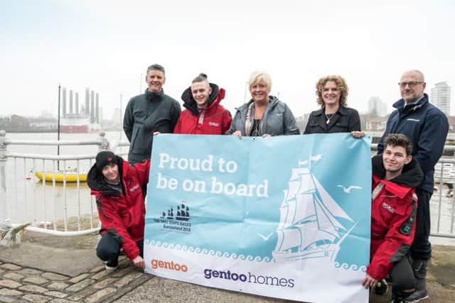Gentoo officials with Victoria French (Sunderland City Council, second right standing) and Gentoo young sail trainees.