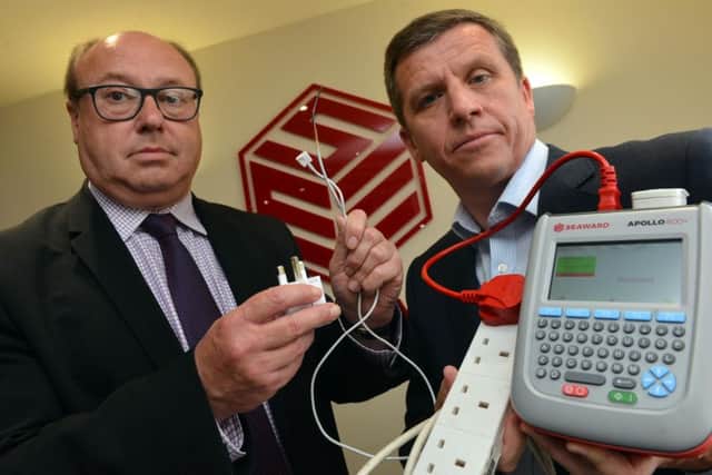 Grahame Morris MP and Seaward managing director Andrew Upton, with a testing appliance.