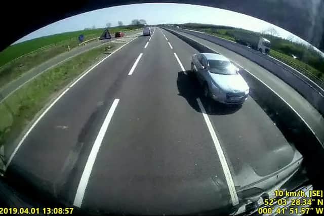 Dashcam video shows driver going the wrong way along motorway - before ...